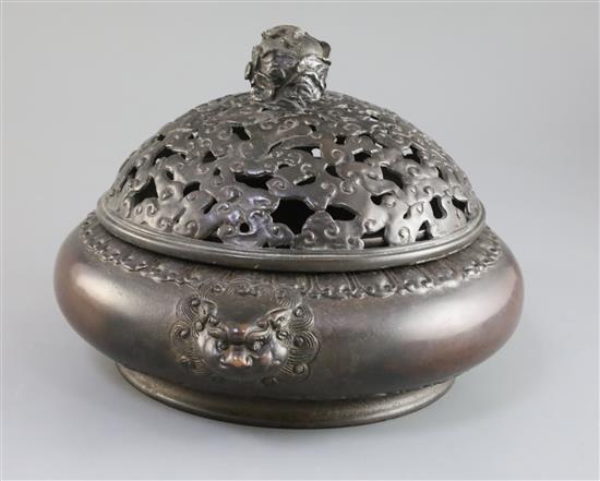 A large Chinese bronze censer, 17th/18th century with 16th/17th century bronze cover, W. 28cm